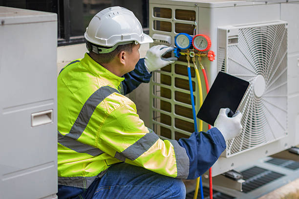 Professional Hvac Maintenance technician working in Millville, MA